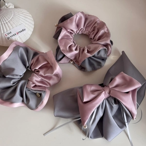 Three-piece set of satin scrunchies and bow clip with pearls in dusty pink and grey