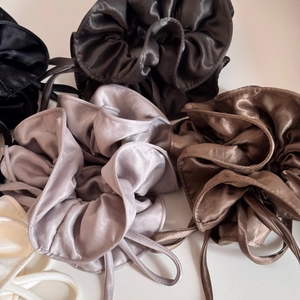 Elegant satin bow scrunchies with long ribbons in multiple glossy silk-like colors