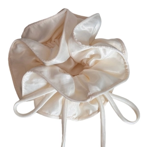 Elegant white satin ribbon scrunchie with a soft pearlescent texture for women