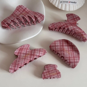 Pink checkered claw clip set with gold lettering for elegant ponytail hairstyles