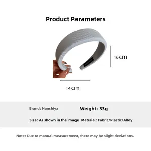 Detailed view of light blue padded fabric headband showing dimensions 14cm width and 16cm height