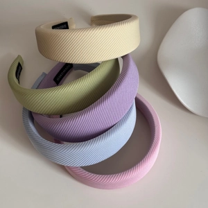 Padded pastel sponge headbands in twill fabric with handmade label, set of five colors