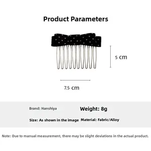 Detailed view of black polka dot bow hair comb with 7.5cm x 5cm size dimensions