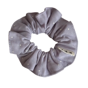 Purple polka dot lace scrunchie made of light mesh fabric with small bow label details