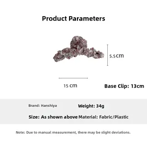 Floral fabric hair claw clip detail showing dimensions 15cm x 5.5cm on white background