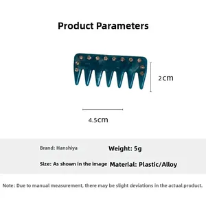Detail view of emerald green mini hair comb with crystal inlay and 4.5cm size markers