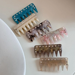 Set of 6 vintage hair combs with rhinestones in diverse colors and marble patterns