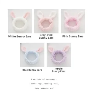 Detail view of plush rabbit ear headbands in white, pink, blue, and purple colors