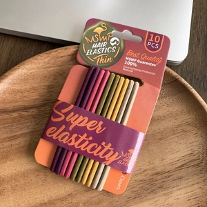10-piece set of colorful high-elasticity hair ties in minimalist candy colors on wood tray