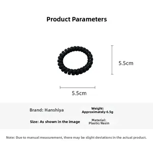 Detail view of black spiral hair tie with 5.5cm diameter and 6.5g resin material