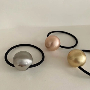Minimalist elastic hair ties with large brushed metal balls in gold, silver and rose gold