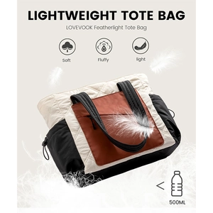 Detailed view of lightweight quilted tote bag with feather motifs highlighting softness