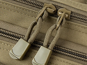 Close-up of tactical nylon fishing bag featuring durable dual zippers and paracord pullers