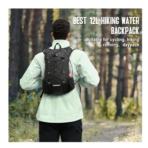 Outdoor 12L cycling backpack with cross bungee system and reflective strips on forest trail