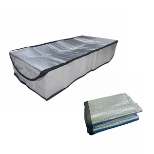 Foldable aluminum foil attic ladder insulation cover with black trim on white background
