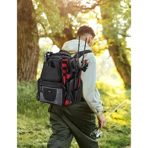 Outdoor view of a waterproof fishing backpack with rod holder and multiple storage pockets