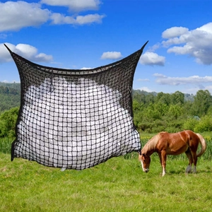 Detail of durable black mesh hay net featuring heavy duty woven rope for slow feeding horses