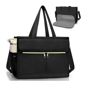 Large black insulated lunch bag with gold zippers and side water bottle pocket
