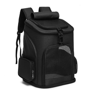 Detail of breathable mesh windows and side storage pockets on a black pet carrier backpack