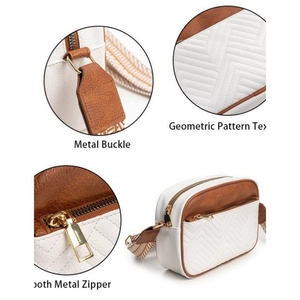 Faux leather crossbody bag with herringbone texture and wide jacquard strap