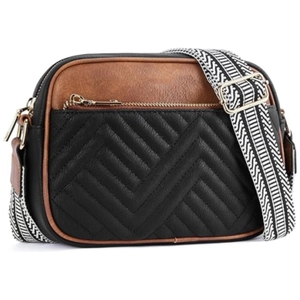 Crossbody camera bag in black and tan faux leather with V-quilted texture and striped strap