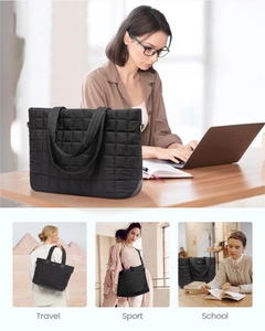 Détail du sac cabas matelassé noir avec motif à carreaux et anneau en D pour bandoulière