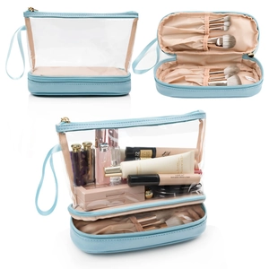 Détails d'une trousse de maquillage double couche en PVC clair avec fentes pour pinceaux