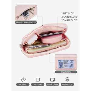 Pink nylon mini wristlet wallet with organized card slots and clear ID window view