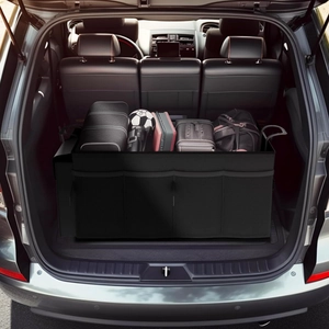Car trunk organizer showing spacious compartments with football and mesh pockets