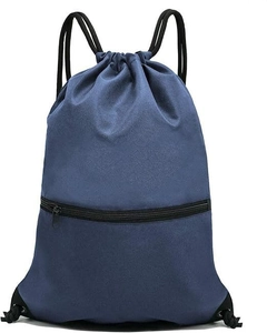 Close-up of waterproof dark blue drawstring bag showing tear-resistant nylon texture