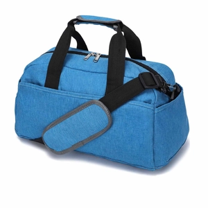 Detail view of small blue fitness bag showing smooth dual zippers and side pocket