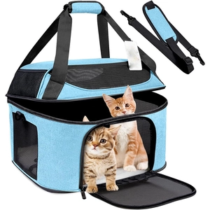 Detail view of breathable mesh side window and large zipper opening of the pet carrier bag