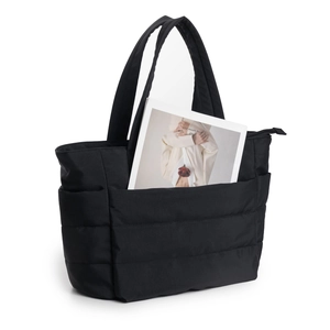 Black quilted puffer tote bag with top zipper and front pocket for casual travel