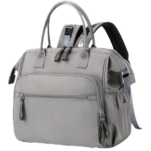 Waterproof grey diaper bag backpack for strollers with large capacity and reinforced handles