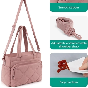 Dusty pink quilted insulated lunch tote with adjustable strap and diamond stitch pattern