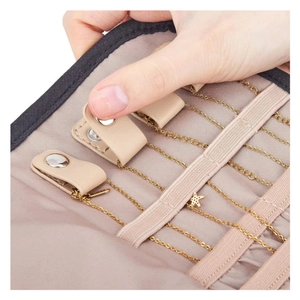 Faux suede jewelry roll with snap straps and elastic loops for necklace storage