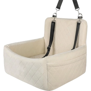 Quilted beige dog car seat with safety straps and storage pocket for small pets