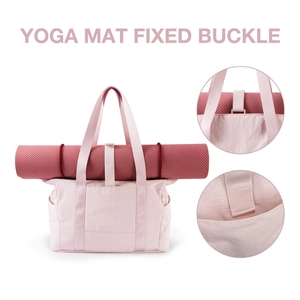 Pink tote bag with fixed buckle for yoga mat and side pocket on white background