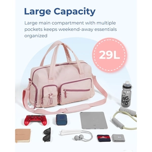 Detail showing 29L pink travel tote bag with large main compartment and functional pockets