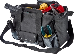 Macro view of a large oxford cloth tool bag with multiple pockets and shoulder strap