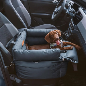 Detail view of a waterproof dog car seat with plush padding and safety leash attachment