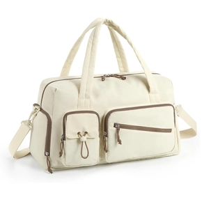 Off-white travel duffel bag with shoe compartment and adjustable brown shoulder strap