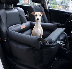 Detail of durable waterproof leather car pet seat with metal hooks and brown logo patch