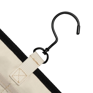 Detail of wall-mounted sunglasses organizer with durable canvas and rotatable metal hook