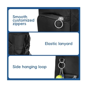 Detail view of smooth metal zippers, elastic sunglass lanyard and metal hanging loop on bag