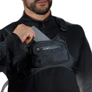 Waterproof black tactical chest bag for running and outdoor sports shown on model