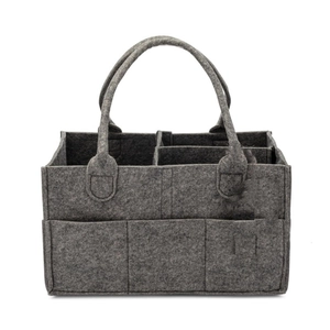 Detail of grey felt diaper caddy with sturdy handles and exterior side pockets