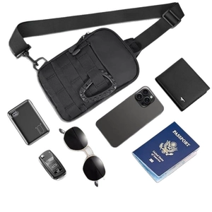 Tactical black nylon chest bag with MOLLE system and multiple storage pockets for travel