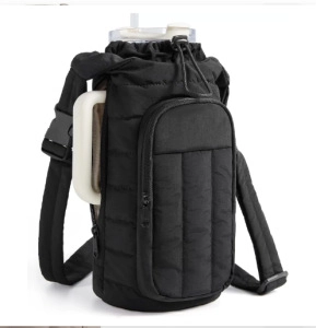 Detail of black quilted water bottle carrier with front zipper pocket and adjustable strap