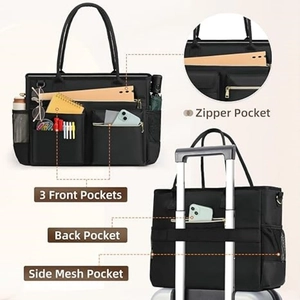 Black waterproof nylon laptop tote bag with front pockets and luggage strap